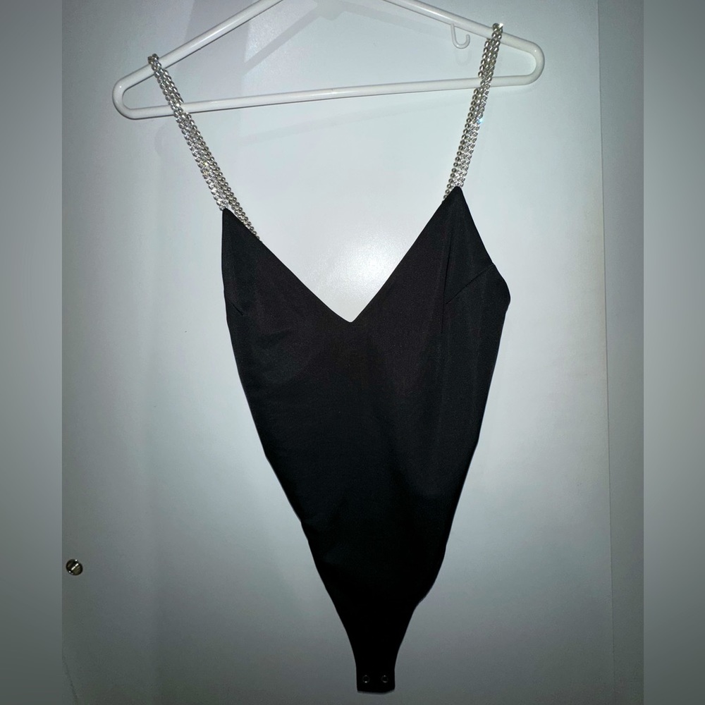 Black bodysuit with gemstone straps